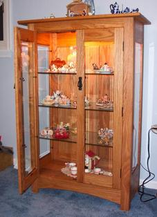 oak curio cabinet with beveled glass